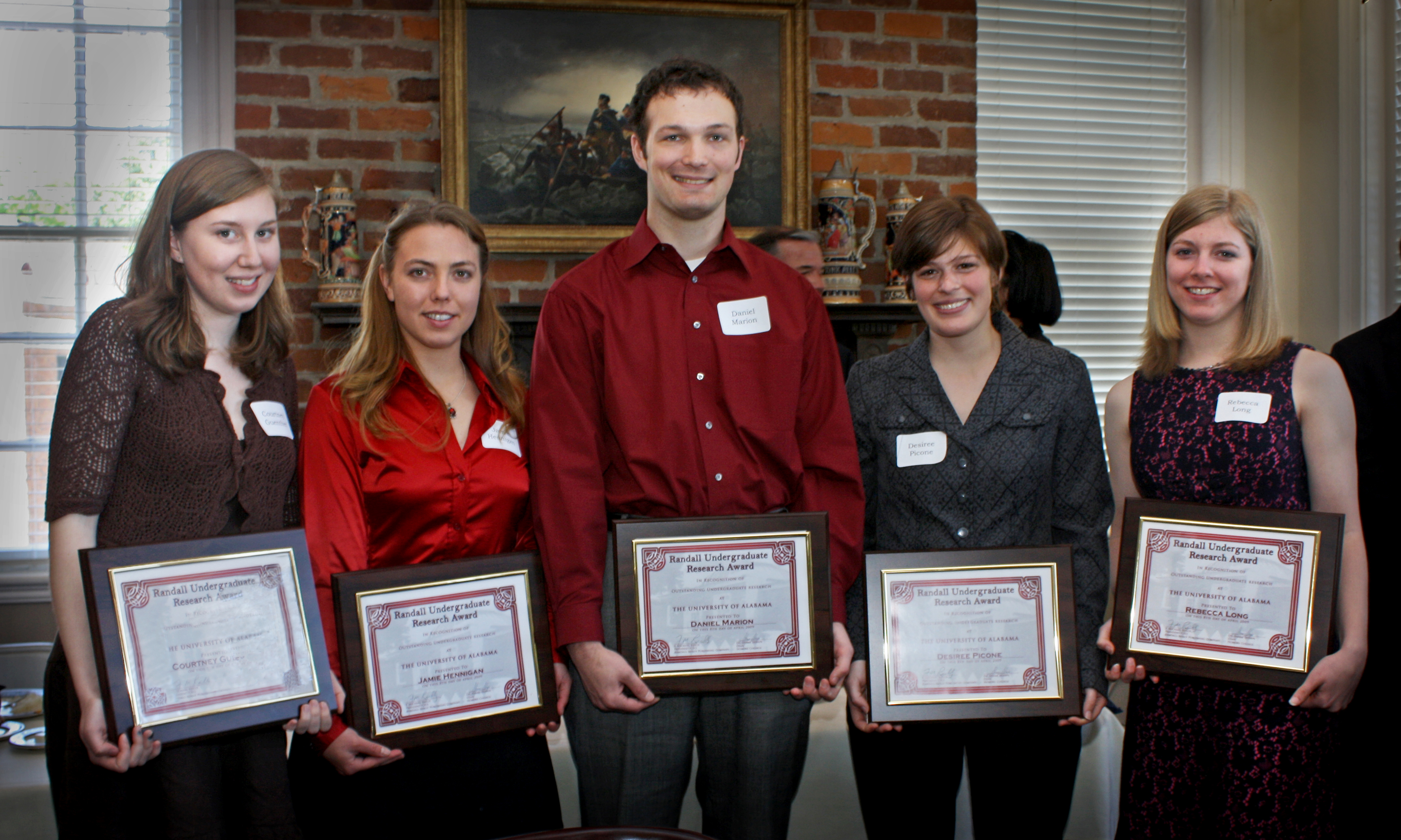 Story Image - Research award winners with certificates
