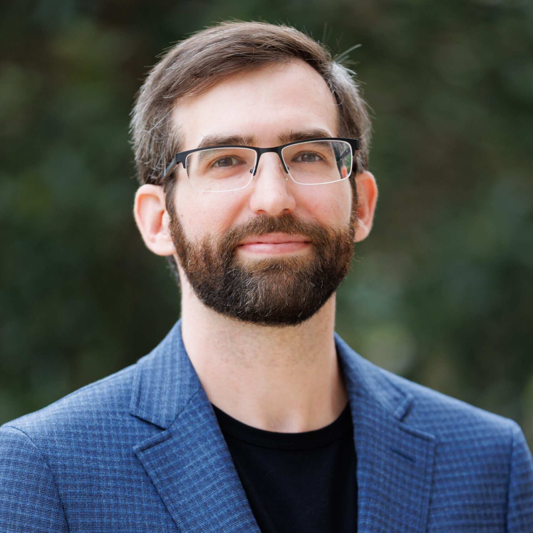 A headshot of Alan Lazer.