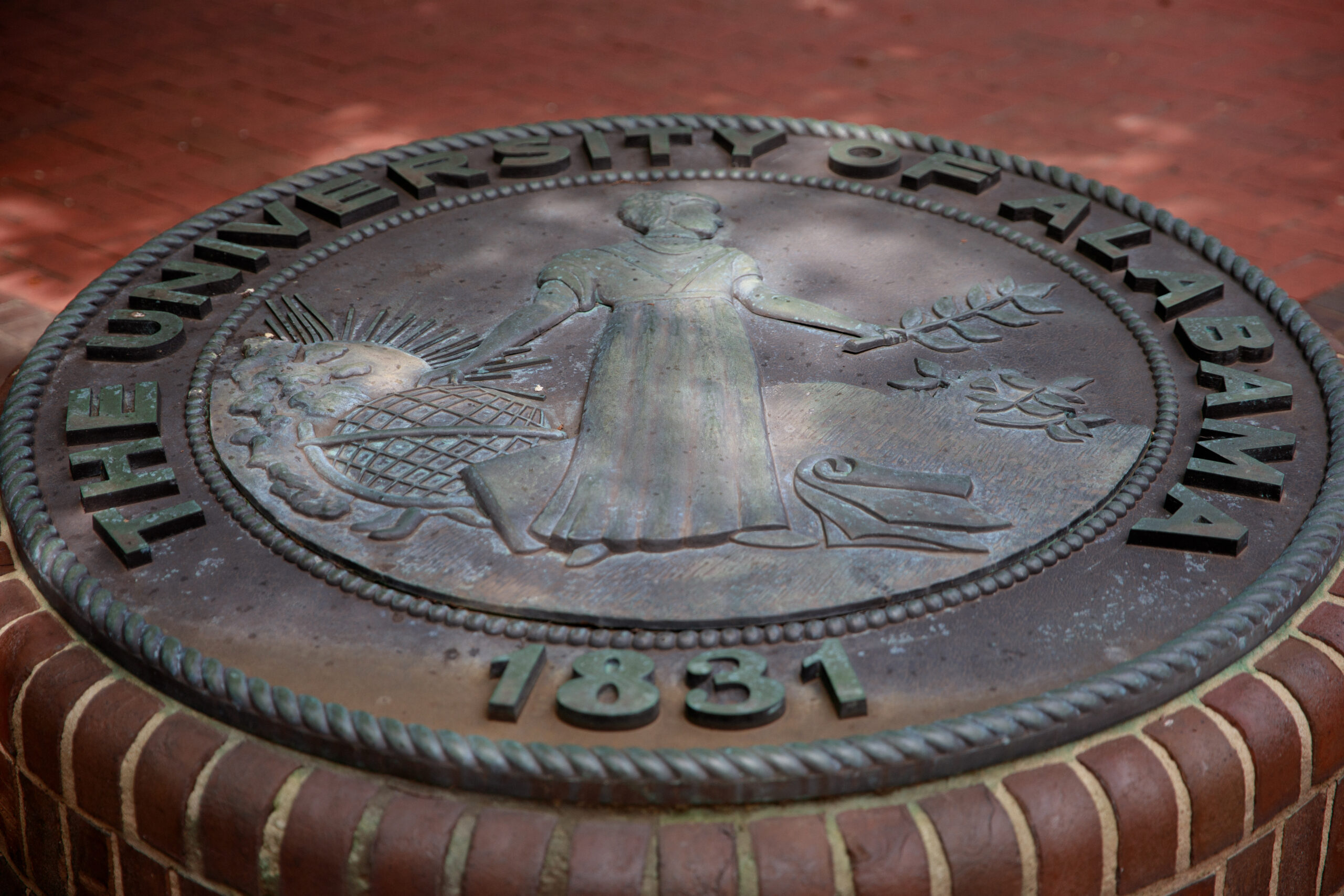 A stone of the Univsersity of Alabama seal.