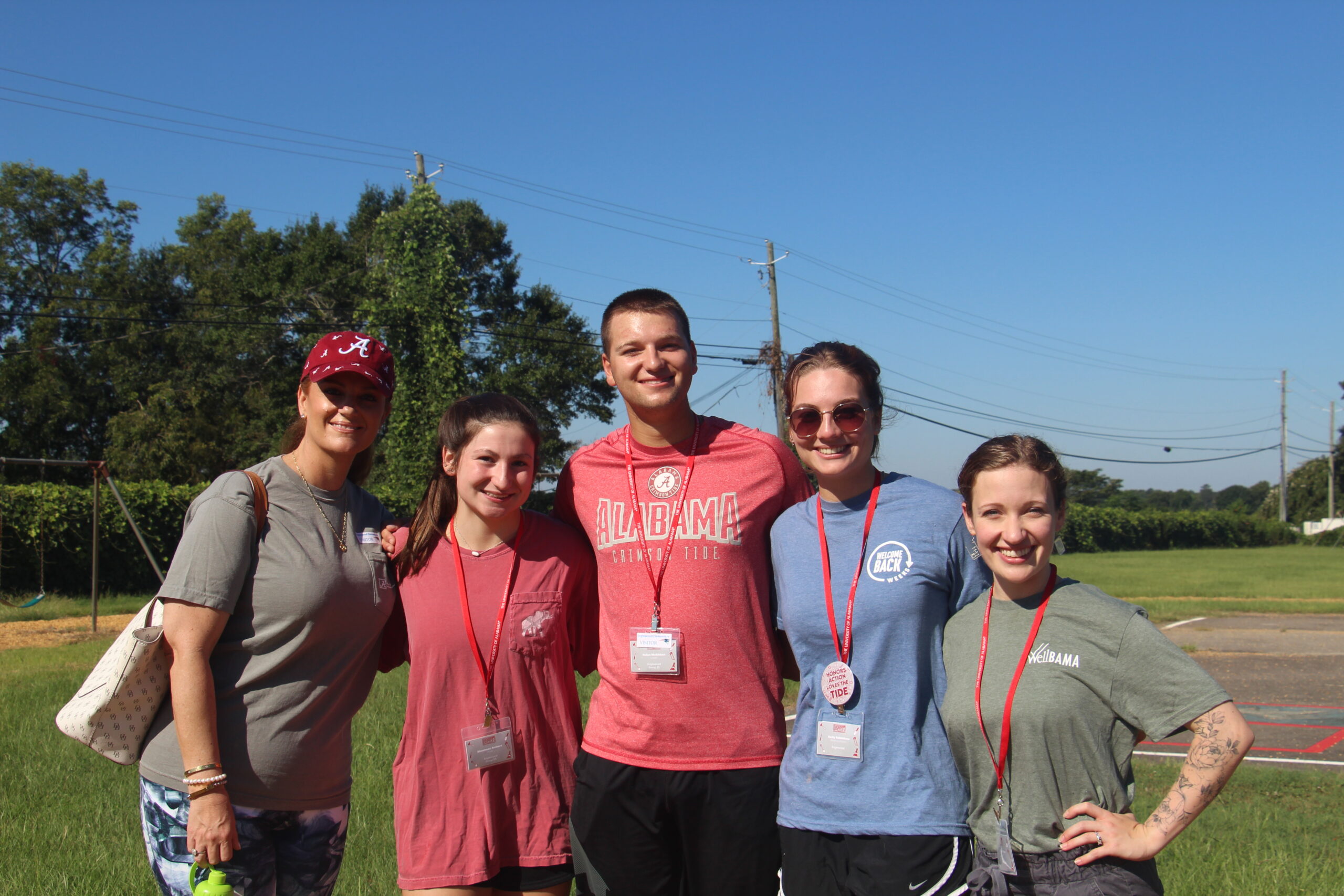 Three Honors students, Dean Tiffany Sippial and Dr. Katie O'Harra smile for the camera.