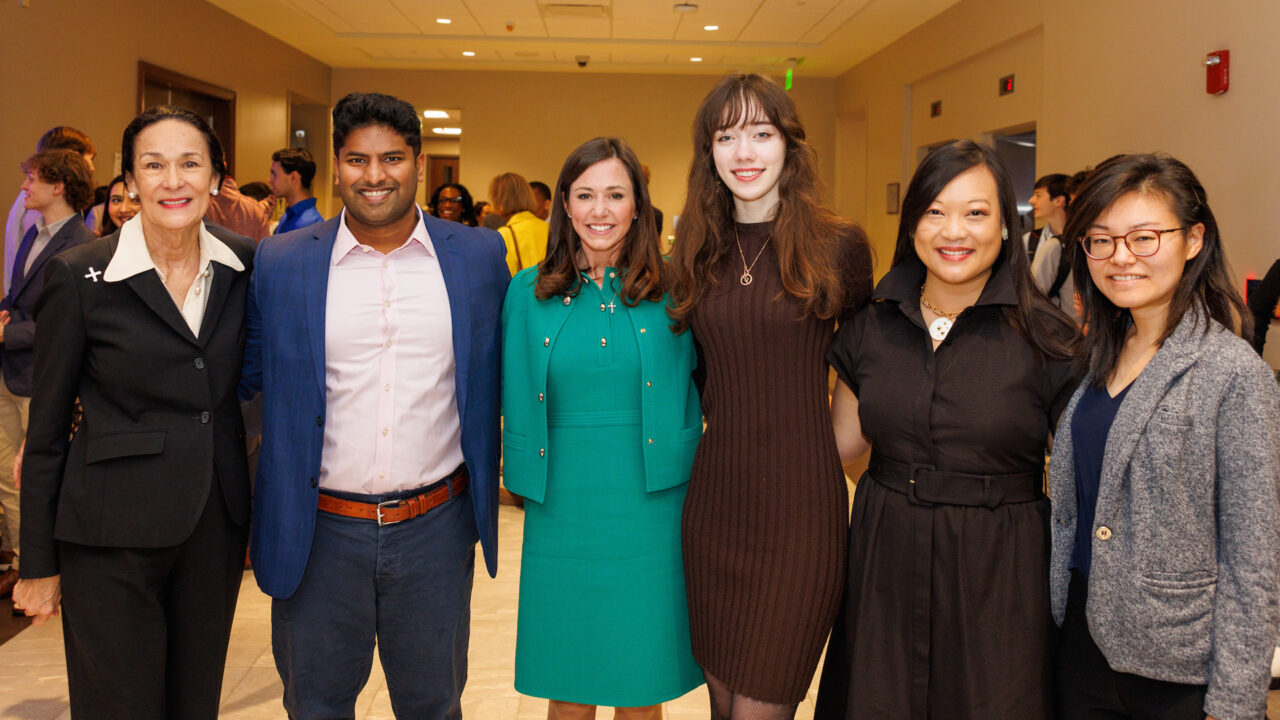 A group shot of Dr. Randall, Senator Katie Britt, and Randall Research Scholars.