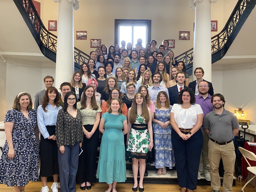 Dr. Megan Bailey and Dr. Lucy Kaufman pose with the newest inductees of Phi Beta Kappa.