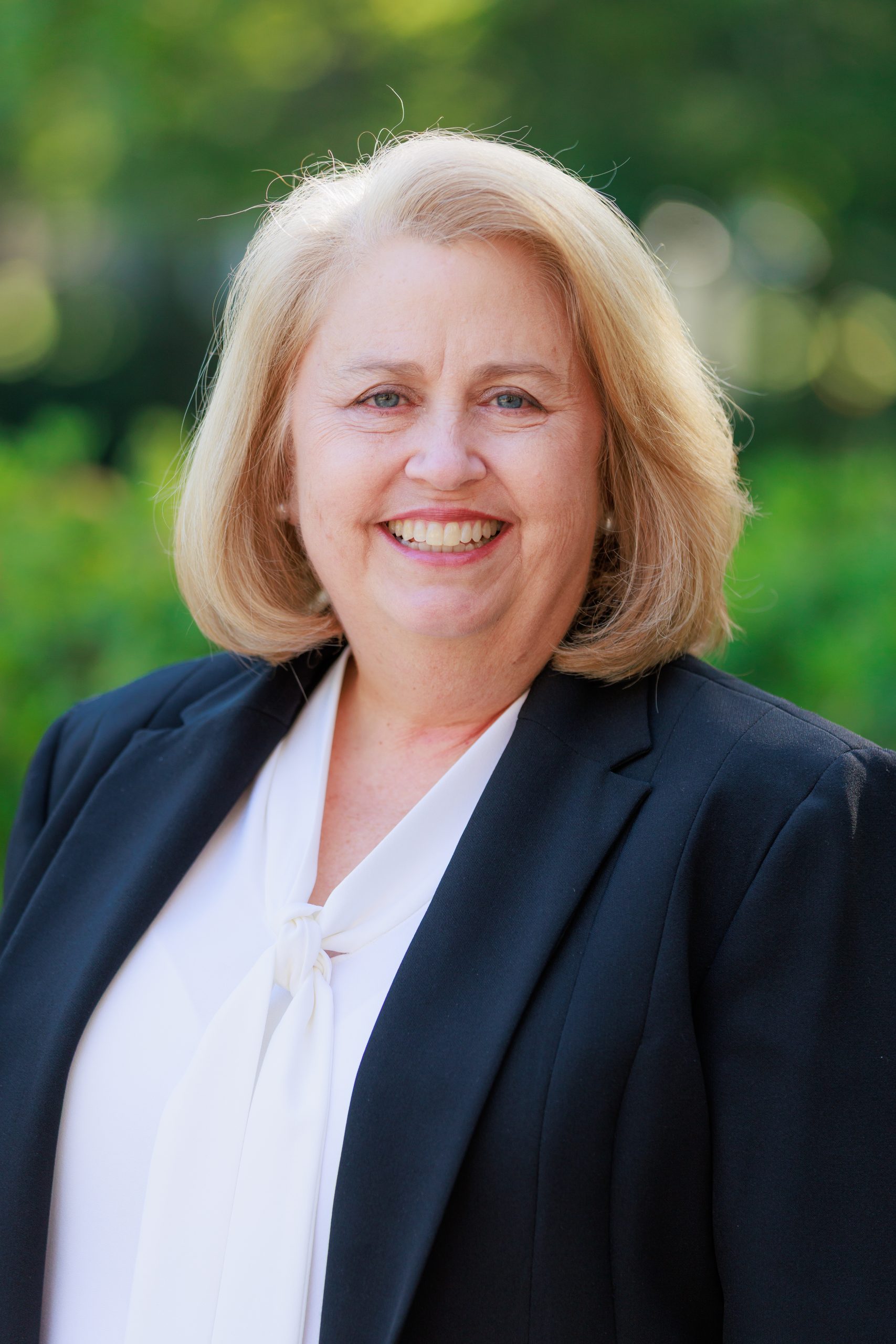 A headshot of Janet Brown.