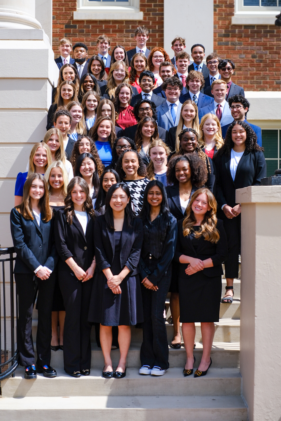 A group photo of the Honors College Ambassadors on the steps of Honors Hall.