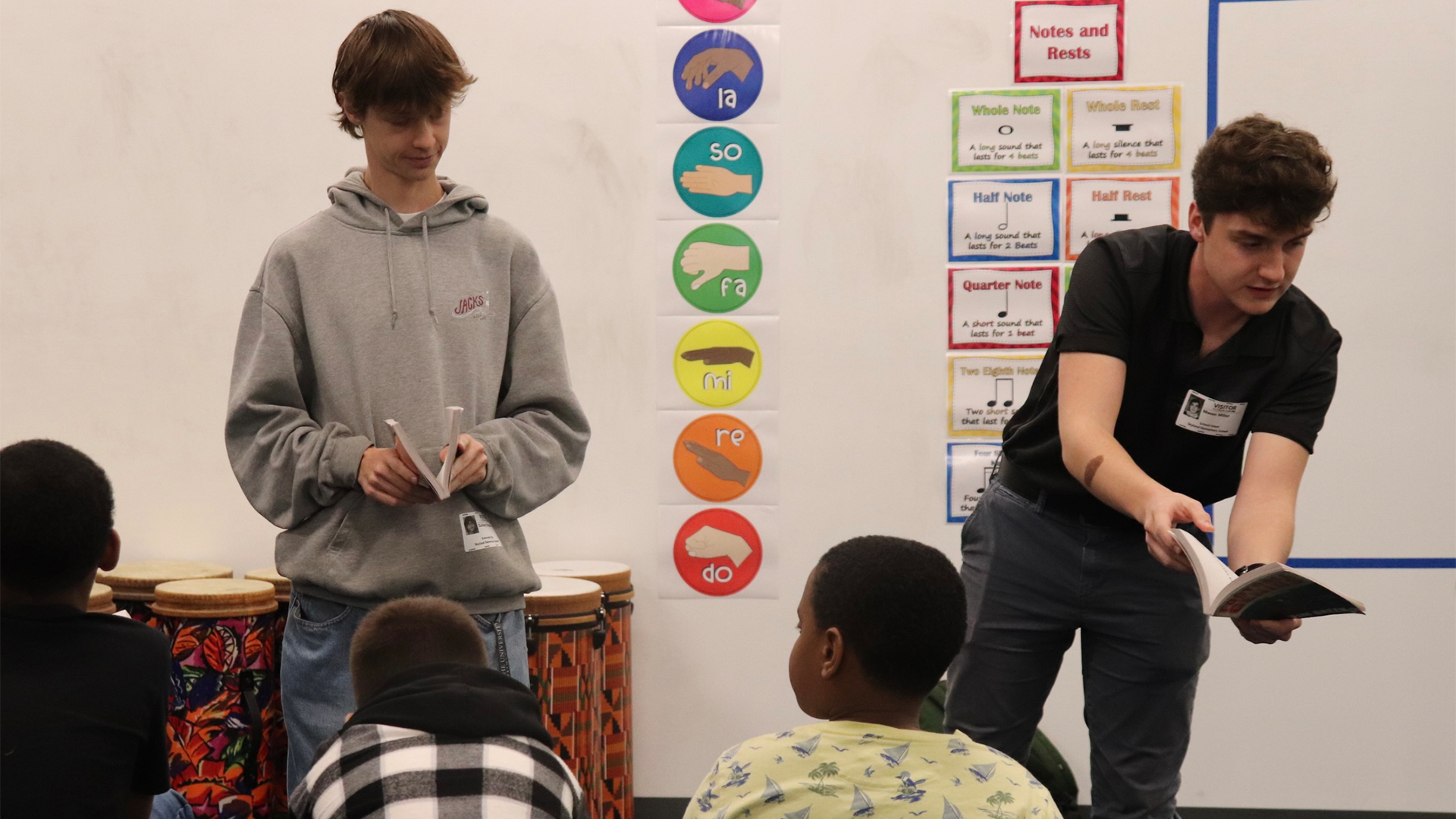 University of Alabama Students reading to elementary school students