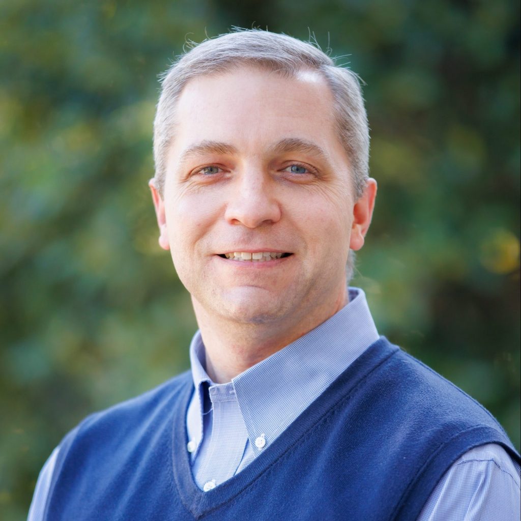A headshot of Dr. Darren Surman